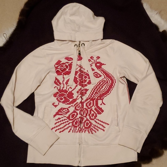 cream and red hoodie